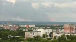 Россия: взрывы боеприпасов на военном складе в Красноярском крае (видео)