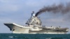 Черный дым из трубы «Адмирала Кузнецова» при проходе через пролив Ла-Манш в 2016 году