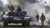 Танк российских гибридных войск на улице Донецка осенью 2014 года