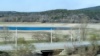 Вид на Симферопольское водохранилище со стороны автодороги «Симферополь – Ялта». Песчаные берега когда-то были дном водоема, 6 апреля 2020 года