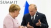 Год назад на саммите в Осаке (Япония) Ангела Меркель и Владимир Путин и не подозревали ни о каком коронавирусе