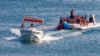 Отдыхающие катаются на надувной лодке, Судак, архивное фото