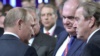 Президент России Владимир Путин и бывший канцлер Германии Герхард Шредер (справа) на заседании международного форума «Российская энергетическая неделя», Москва, октябрь 2019 года