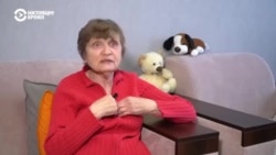 87-летнюю жительницу Минска оштрафовали за красно-белый флаг на балконе (видео)